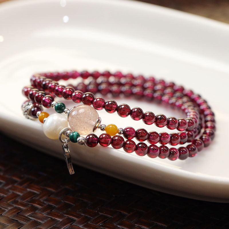 Natural three-ring garnet strawberry crystal multi-treasure bracelet